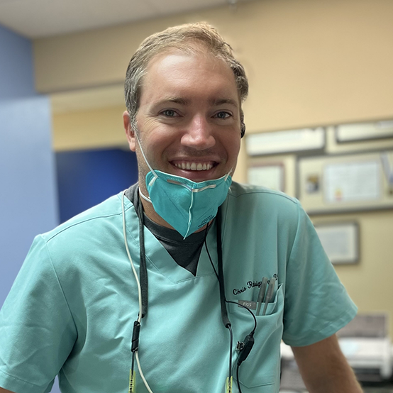 Smiling dentist in Jupiter dental office