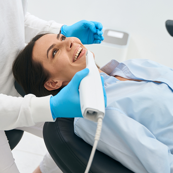 Dental patient receiving an oral cancer screening