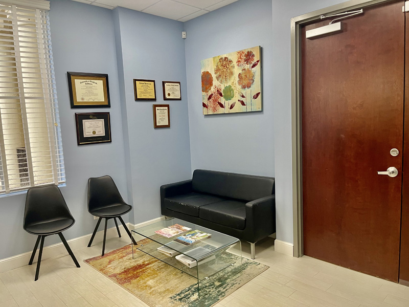 Two chairs and loveseat in waiting area