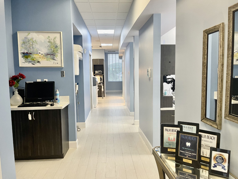 Hallway branching off into dental treatment rooms