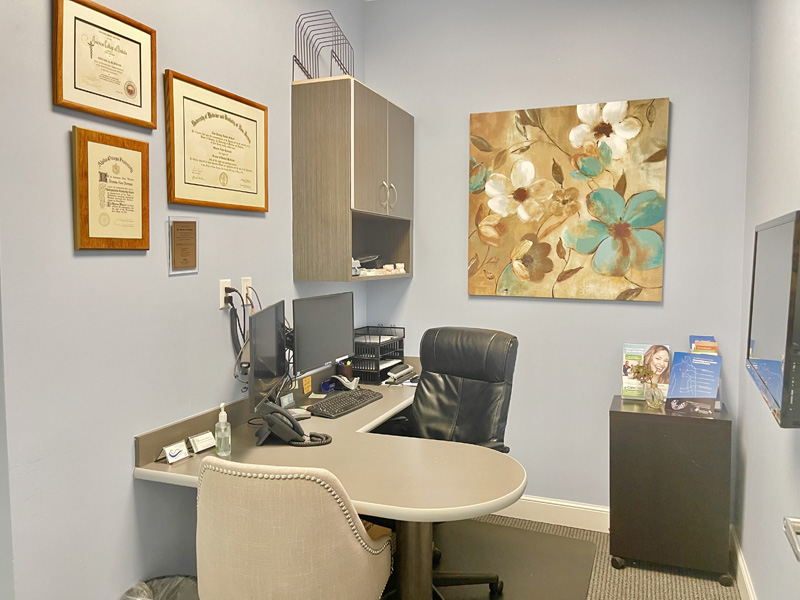 Desk with computer in dental consultation room