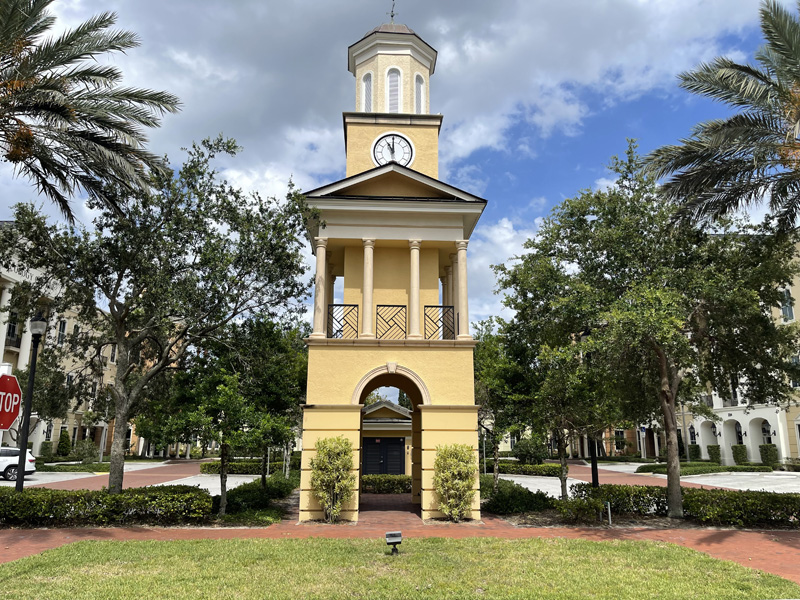 Short clock tower in plaza