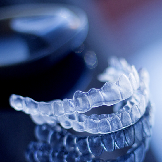 Two Invisalign clear aligners in Jupiter on tray